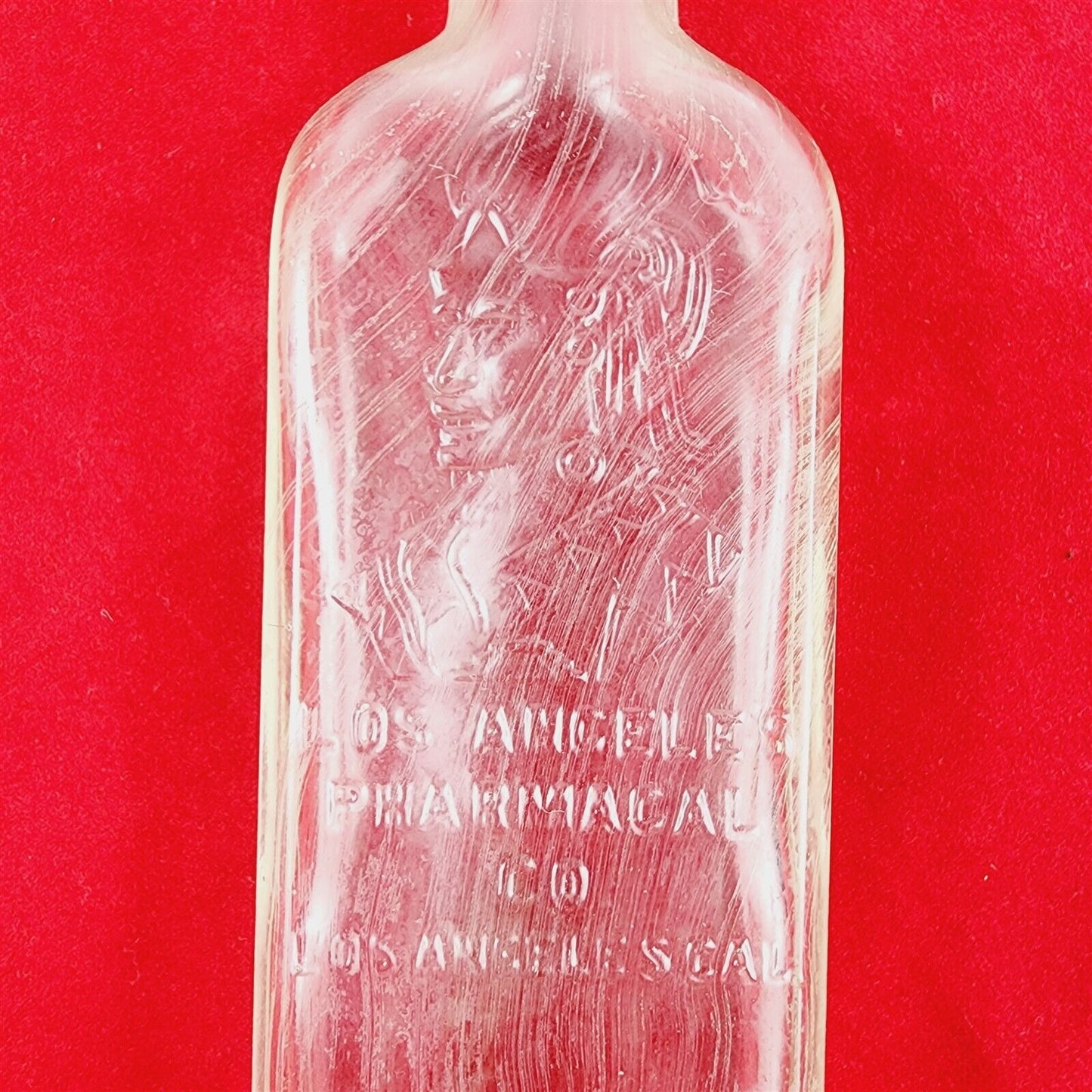 Vintage Embossed Indian Los Angeles CA Pharmacal Co. Glass Bottle Western Cali