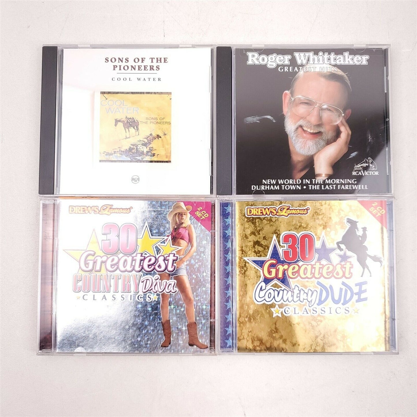 8 Country Music CD's Reba, Floyd Cramer, Roger Whittaker